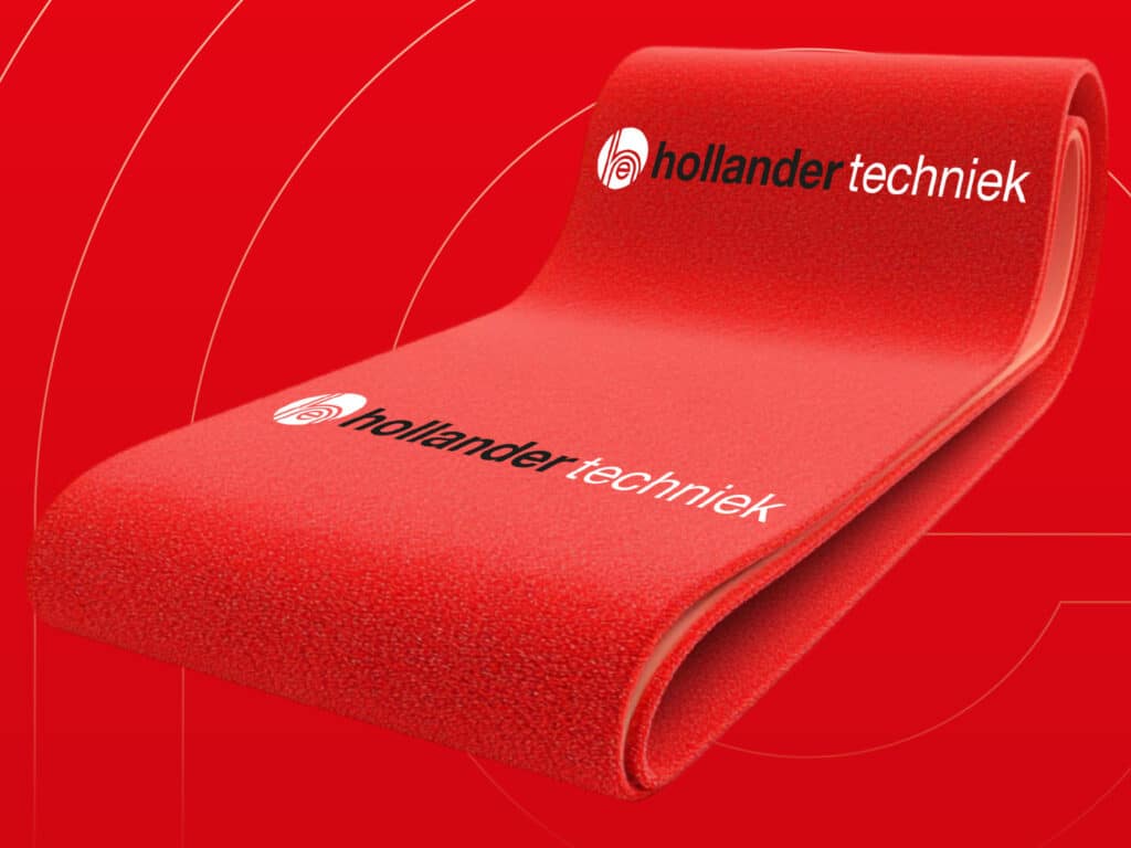 Opgerolde rode loper van Hollander Techniek, inclusief eigen Hollander Techniek logo